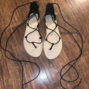 Lace up black gladiator sandals